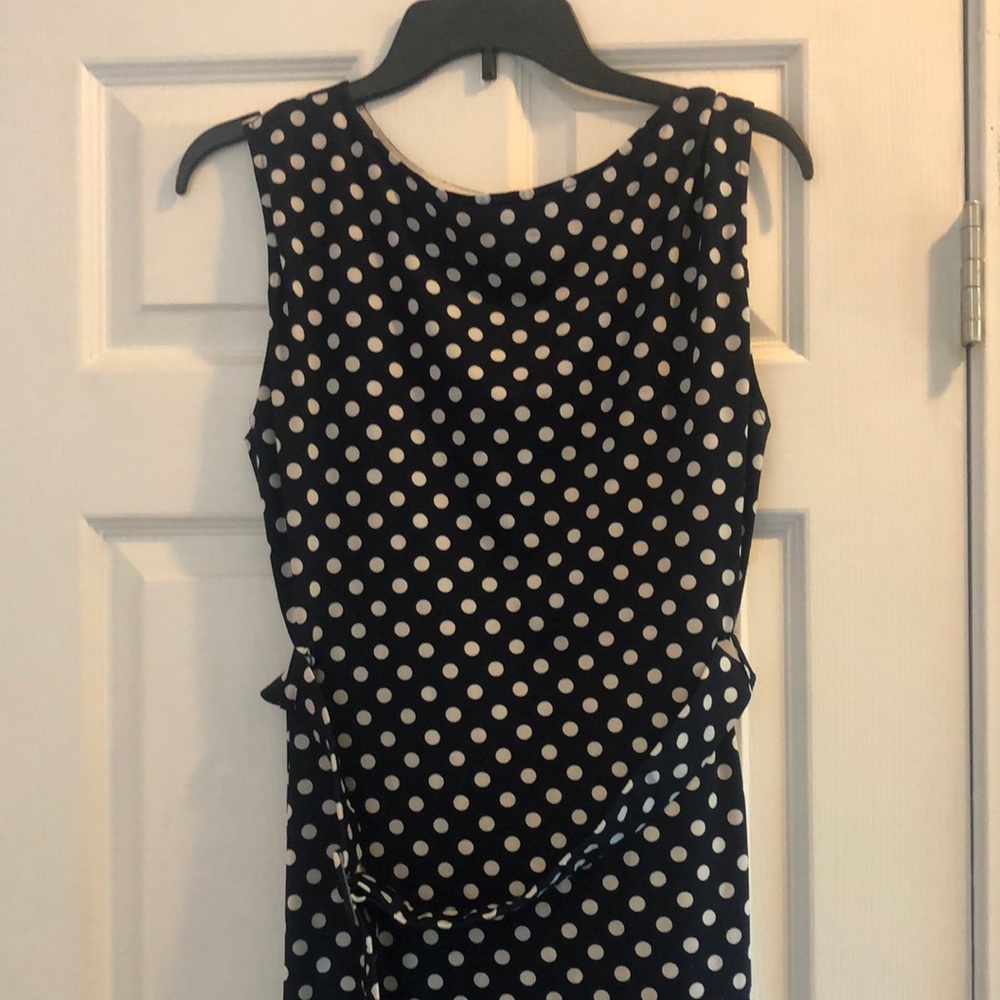 Mid length navy blue and white polka dot dress